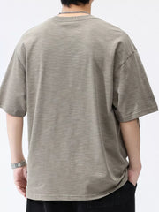 Men's relaxed fit cotton t-shirt in Sage, with a crew neck and short sleeves.