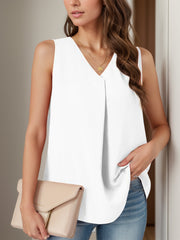 White sleeveless blouse with V-neck and front pleats.