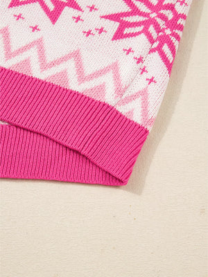 Festive Fair Isle knit top in pink and white with a chevron and snowflake pattern and ribbed hem.