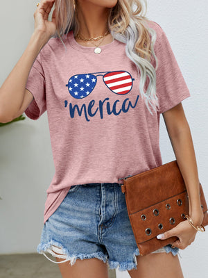 Dusty Pink graphic tee with aviator sunglasses and 'merica script.