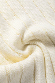 Ivory cable knit mock neck vest with chunky texture and ribbed detail