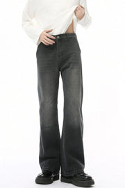Dark wash wide leg jeans with a high rise and pockets.