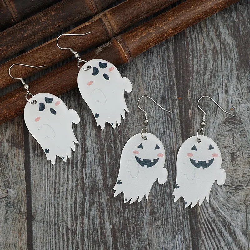 White acrylic dangle earrings with spooky ghost designs and alloy hooks.