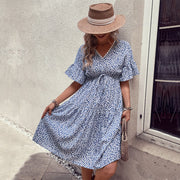 Light blue ditsy floral tiered midi dress with v-neck and flutter sleeves