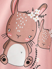 Pale blush cotton crew neck sweatshirt with cute bunny graphic and floral accents.