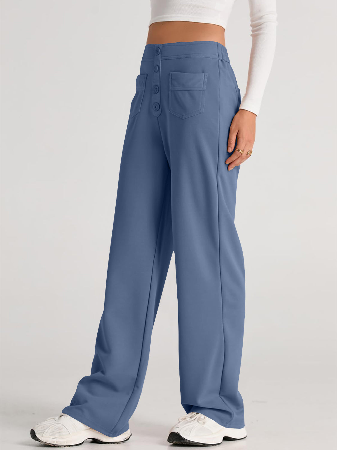 Button-front wide leg trousers in Dusty Blue with two front pockets and a high waist.