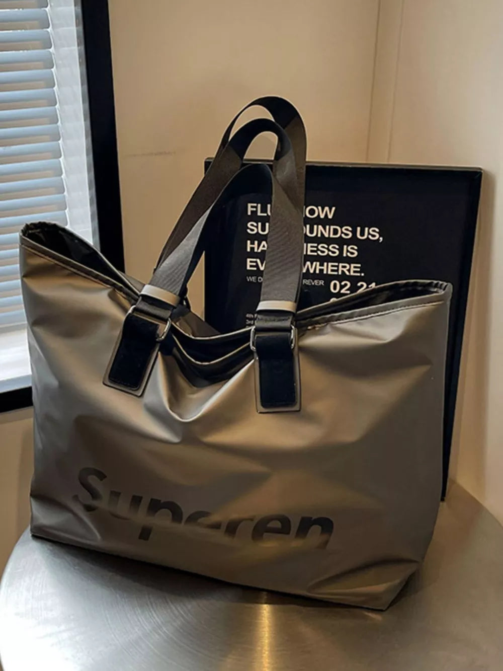 Spacious grey Oxford cloth travel shoulder bag with black "Supersen" logo and dual straps.