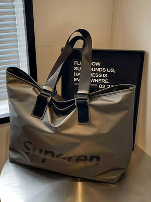 Spacious grey Oxford cloth travel shoulder bag with black "Supersen" logo and dual straps.