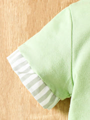 Baby light green short sleeve tee with striped cuffs and matching shorts.