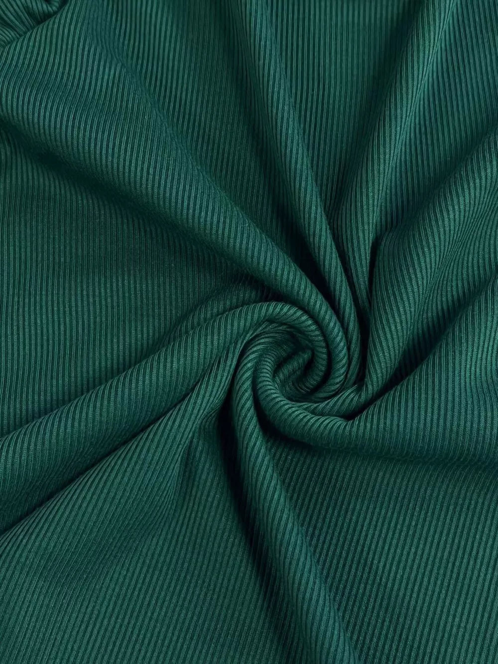 Dark green ribbed t-shirt fabric with a soft texture and vertical ribbing detail.
