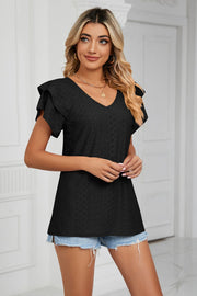 Black eyelet knit v-neck blouse with flutter sleeves and a textured pattern.