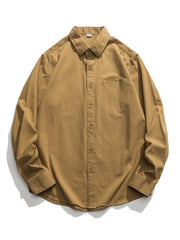 Classic button-down men's shirt in brown cotton with a chest pocket.