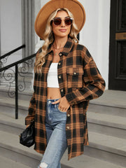 Oversized plaid shacket in caramel brown with black plaid, button front, and chest pockets.