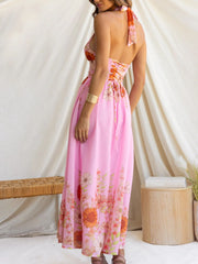 Pink floral halter neck maxi dress with corset back detail