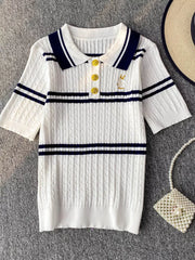 White cable knit polo shirt with navy stripes and gold buttons