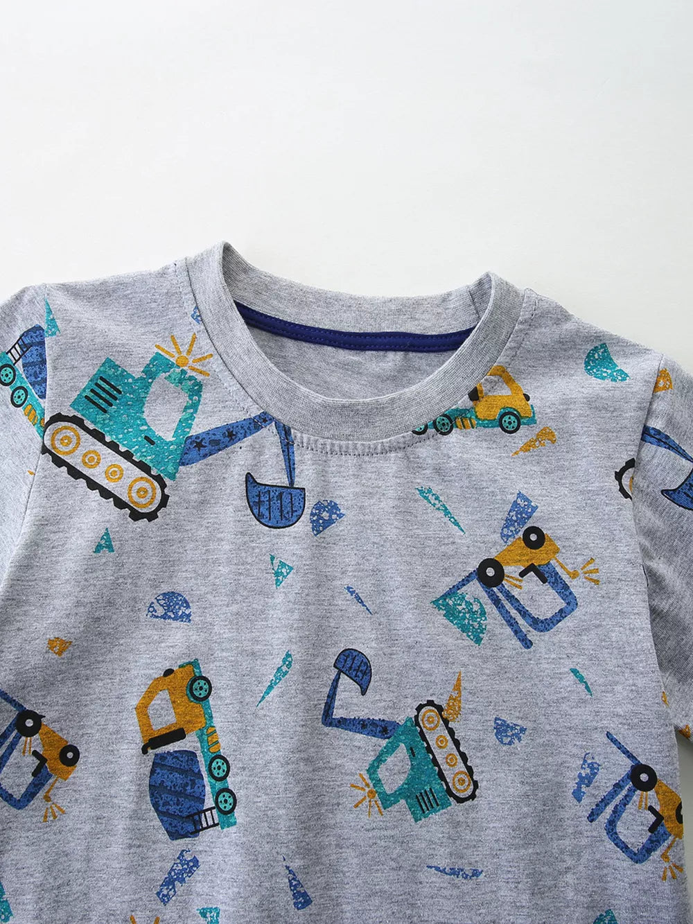 Toddler grey cotton crew neck t-shirt with all-over excavator print.