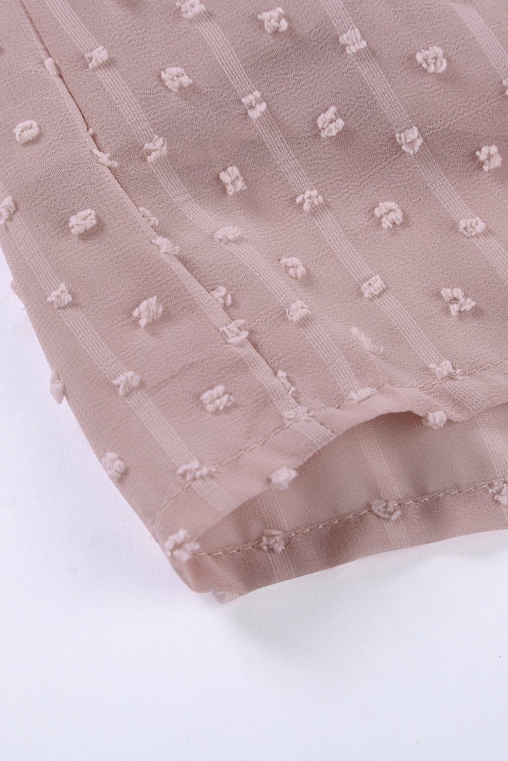 Dotted Swiss lace trim blouse in dusty pink with sheer fabric and textured dots.