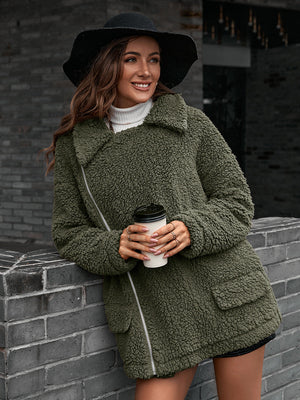 Green teddy moto jacket with asymmetrical zip and pockets, collared, comfortable casual style.