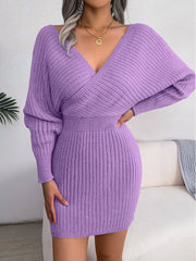 Wrap knit bodycon mini dress in heliotrope purple with a deep V-neck and long dolman sleeves.