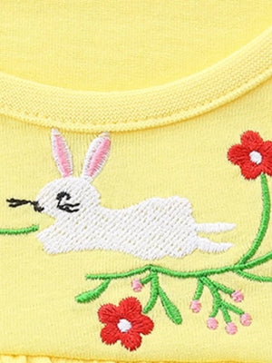Yellow cotton toddler undershirt with embroidered bunny and flowers.