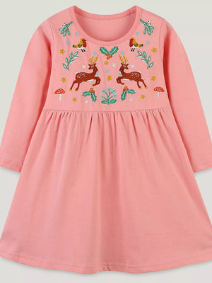 Pink cotton dress with embroidered deer, birds, holly, and mushrooms.