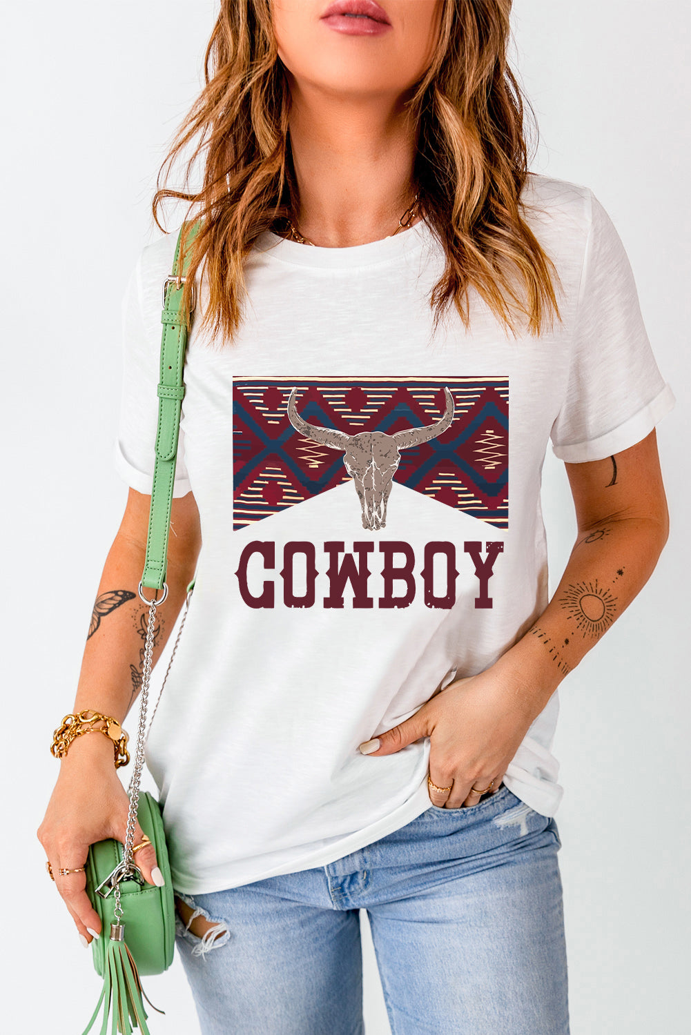 White graphic t-shirt with cowboy skull and geometric pattern, casual fit