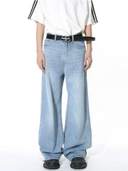 Light blue wide-leg denim jeans with vintage wash and a relaxed fit.