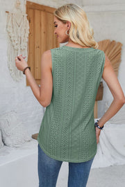 Sage green perforated sleeveless button-down top with eyelet details.