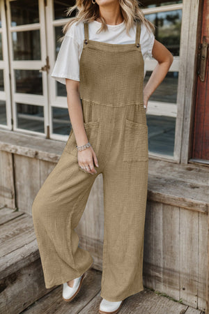 Textured cotton overalls in camel with square pockets and wide legs.