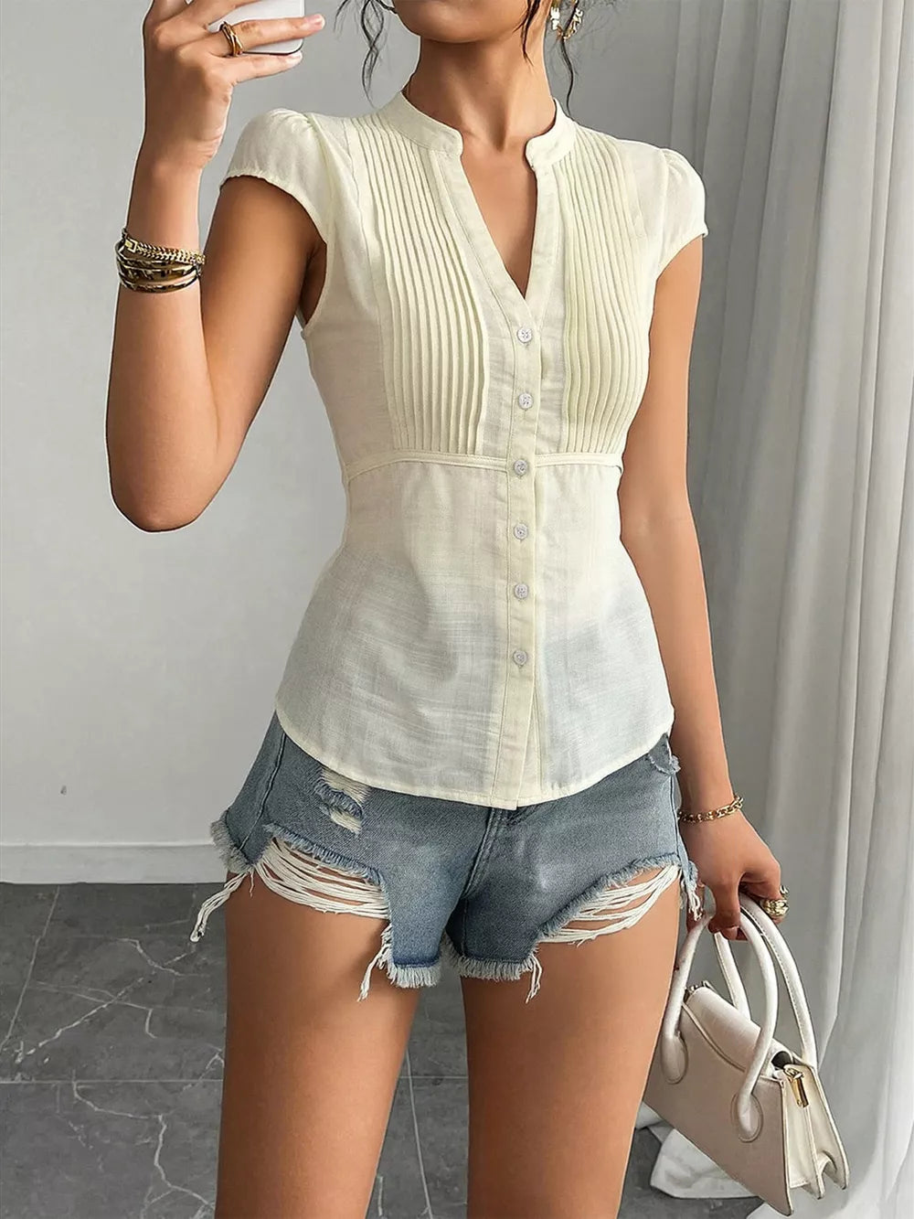 Cream v-neck cap sleeve maternity overshirt with pintuck detail and buttons