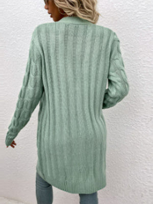 Light Green cable knit button-down cardigan with ribbed texture and cable sleeves.