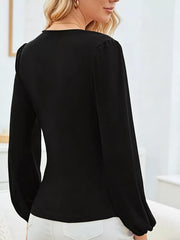 Black polyester maternity blouse with ruched long sleeves and a V-neckline.