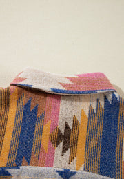 Southwestern print shirt jacket in beige with colorful geometric patterns and a collared neckline.