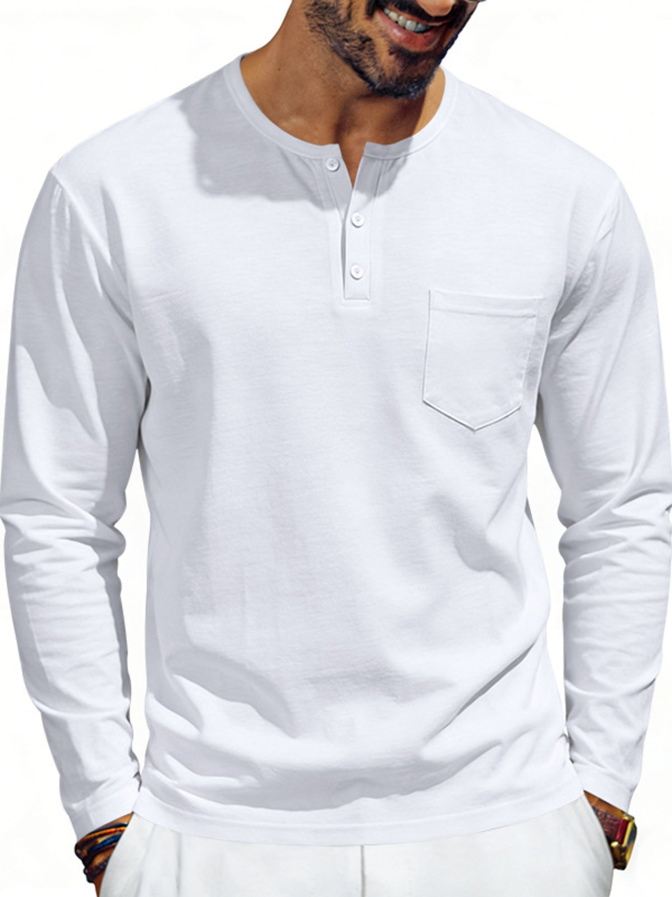 White long sleeve henley t-shirt with button placket and chest pocket.