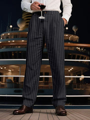 Men's black pinstripe wide-leg sweatpants with a relaxed fit.