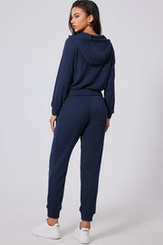 Navy ribbed crop hoodie and jogger set with drawstring waist and cuffed ankles.