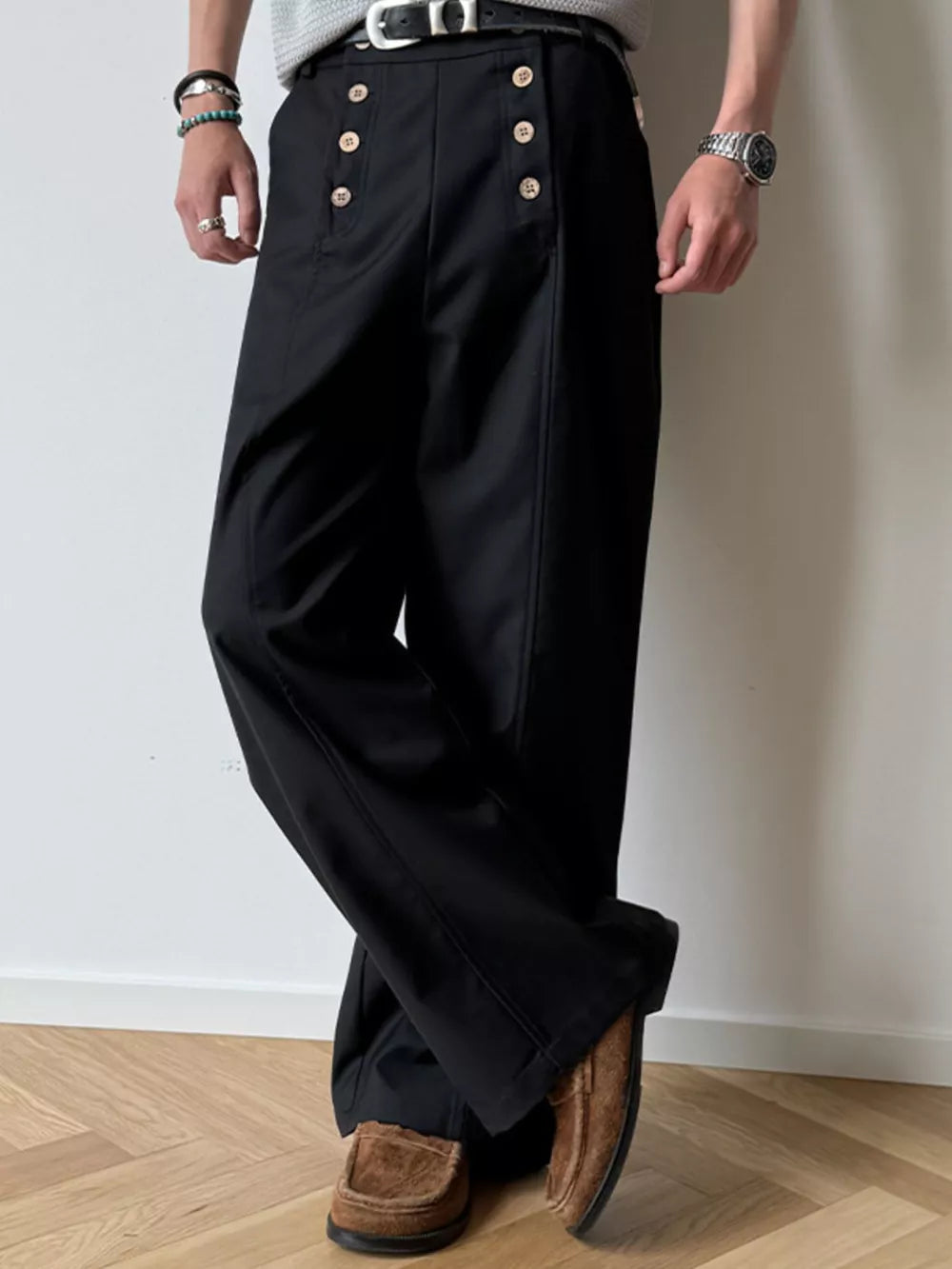 Black high-waisted wide leg pants with button detail