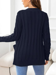 Navy acrylic cable-knit cardigan with pockets and ribbed texture.