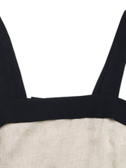 Linen-blend cami with black contrast trim and straps.