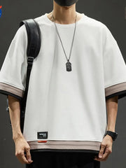 Men's white cotton blend t-shirt with contrast stitching and loose fit.