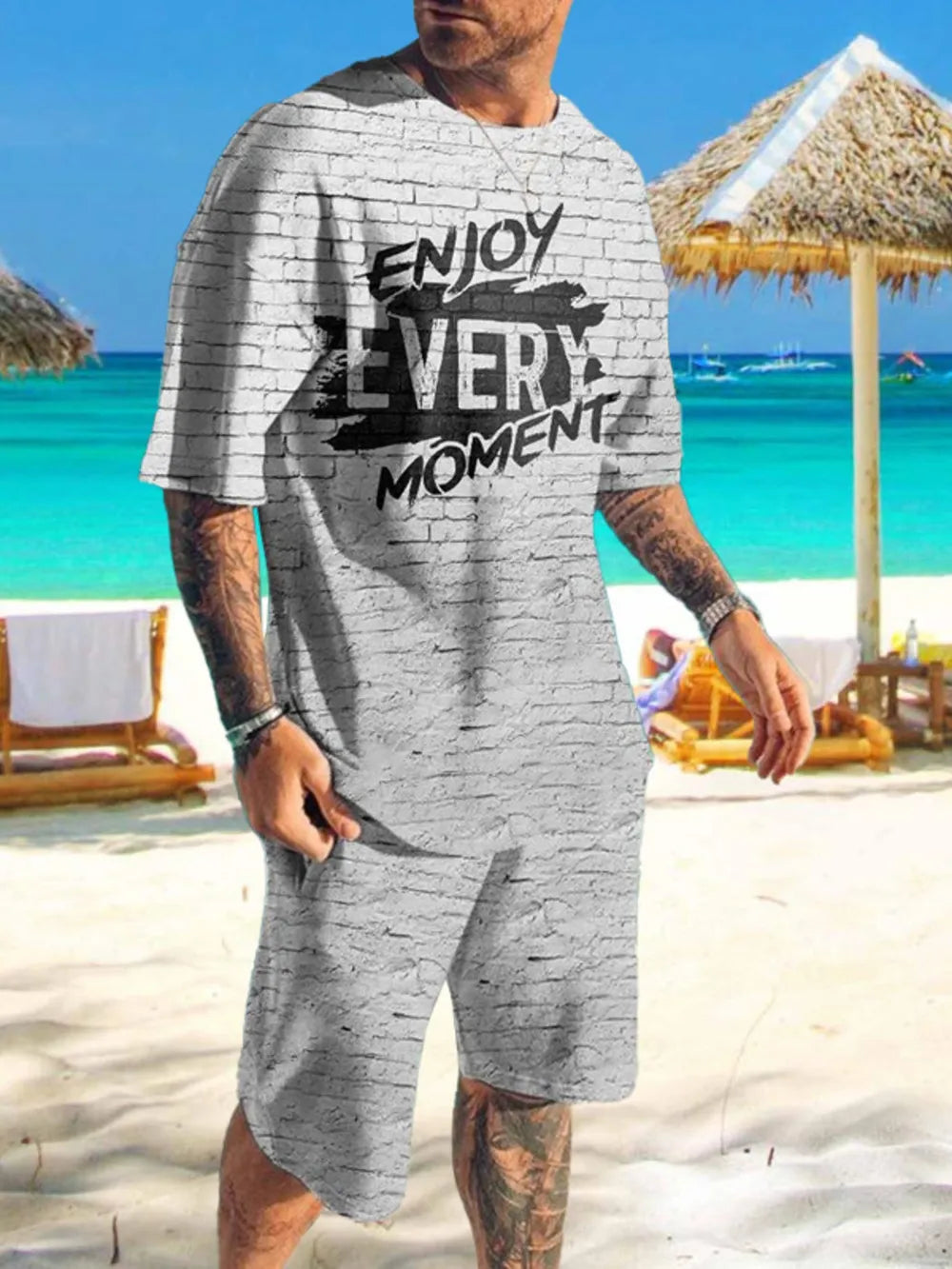 Men's gray two-piece set with brick print and "Enjoy Every Moment" graphic tee.