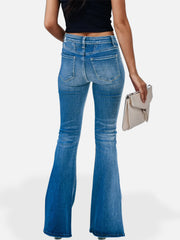 Button-fly flare jeans in medium wash denim with seam detail and a flared leg.