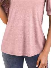 Light pink t-shirt with puff sleeves and a notched V-neck, shown on a model.