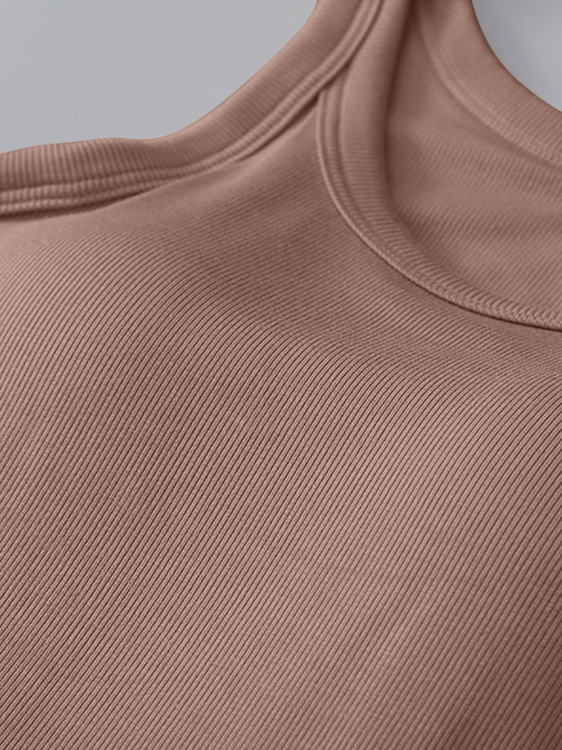 Ribbed knit tank top in a soft brown with built-in bra and rounded neckline.