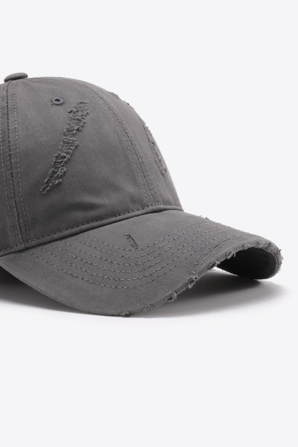 Mid Gray distressed baseball cap with frayed details and adjustable fit