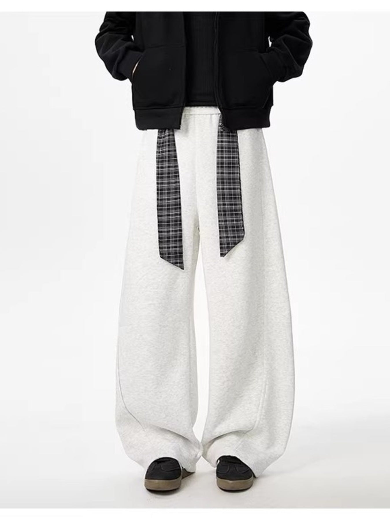Light gray relaxed fit wide-leg sweatpants with plaid tie detail