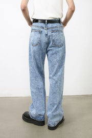Acid wash wide-leg jeans in medium blue denim with a relaxed fit.