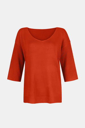Orange V-neck knit sweater with flared 3/4 sleeves and ribbed cuffs.