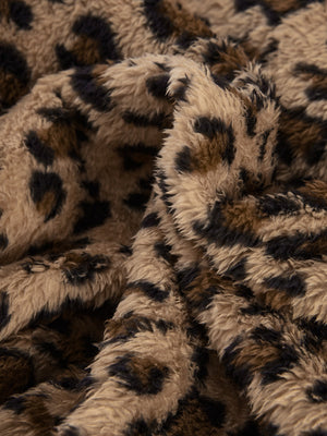Leopard print plush hooded cardigan with a soft, fuzzy texture.