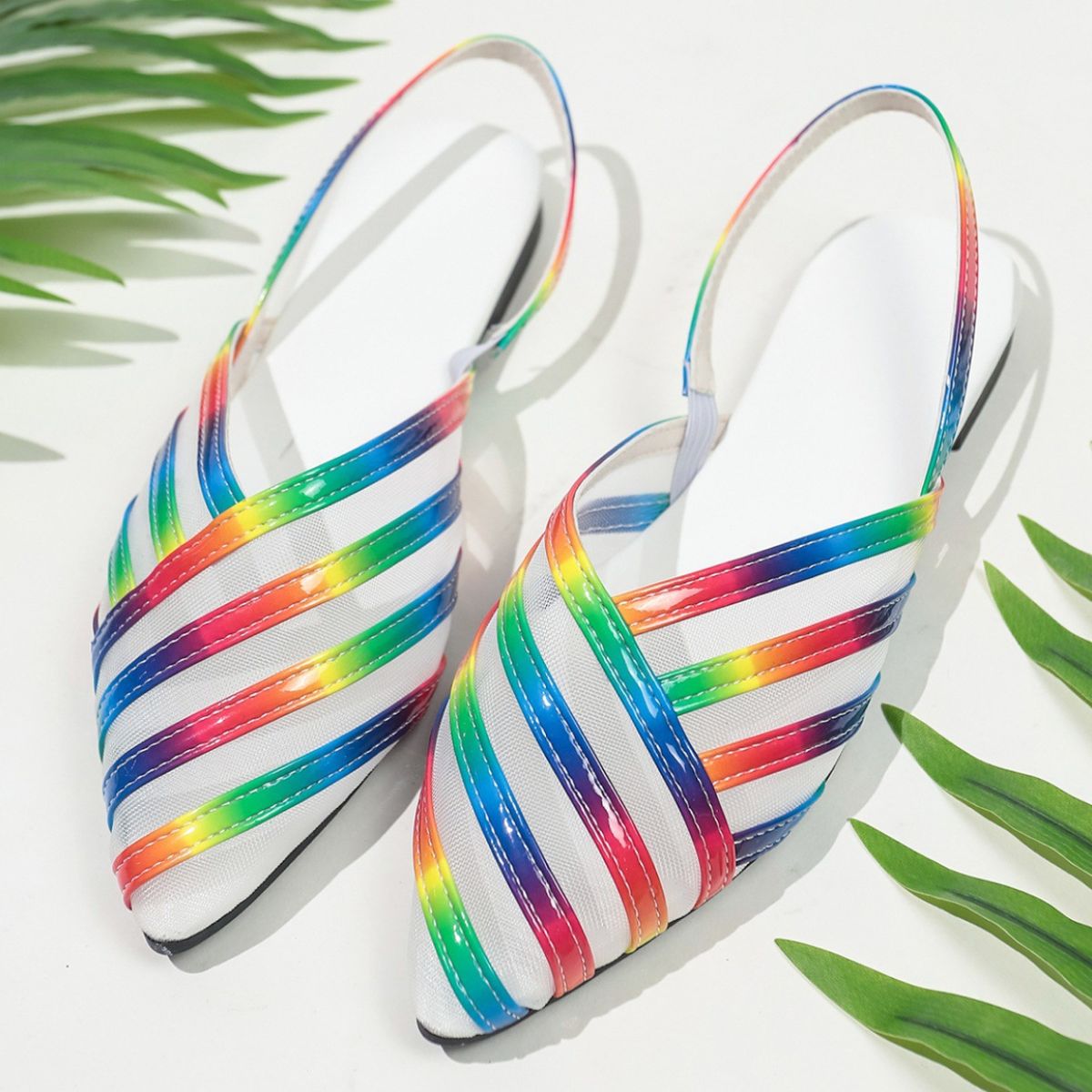 Chic mesh pointed slingback flats with rainbow stripes and white mesh.